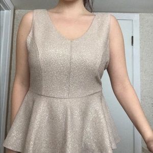 Cream peplum top with sparkles